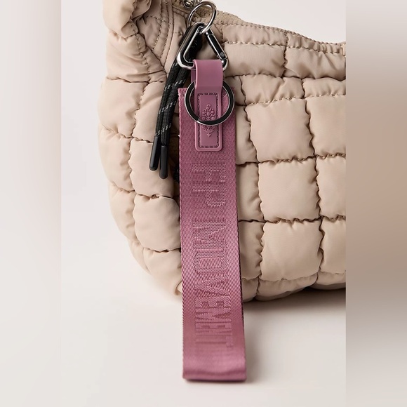 Free People Movement There It Is Keychain in Mystic Mauve NWT - Picture 2 of 2